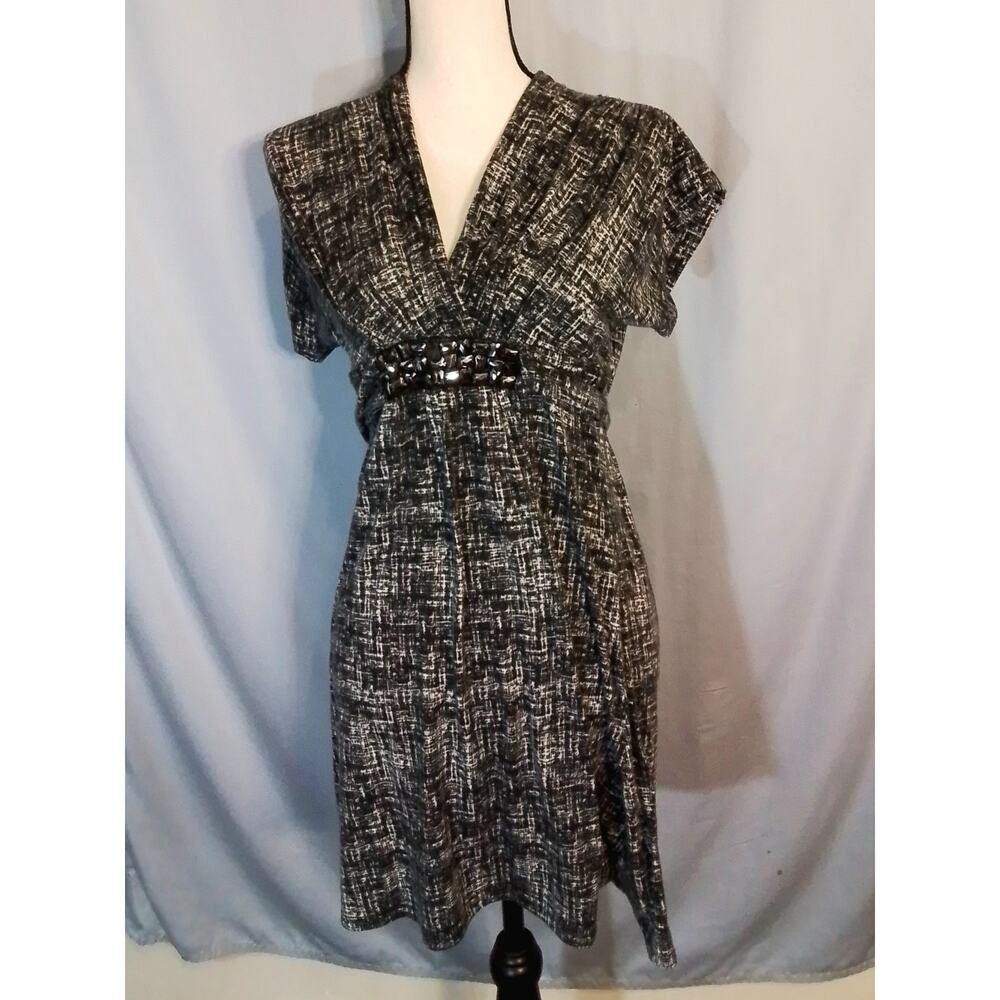 As U Wish black dress with  reflective rivet buttons at waist